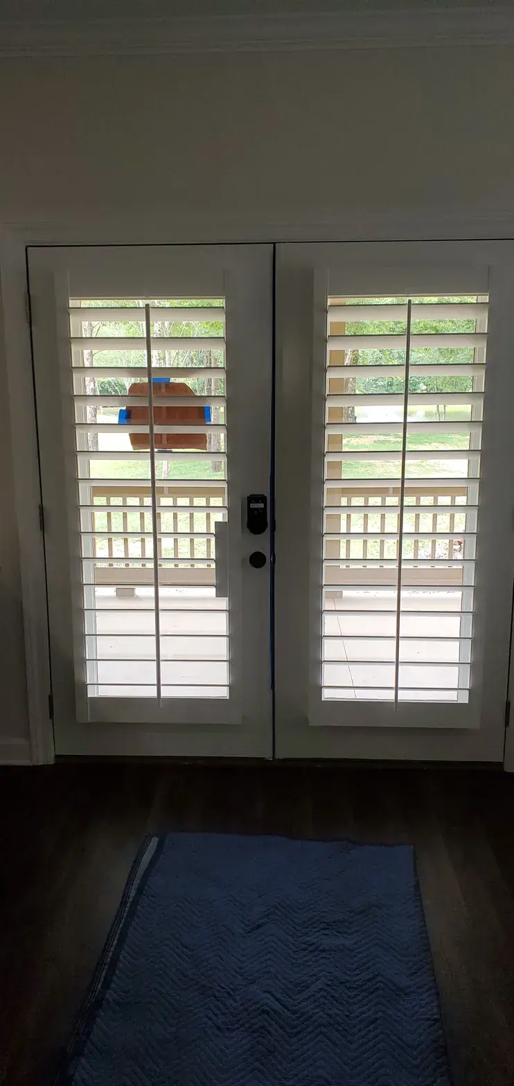 Full height French door plantation shutters
