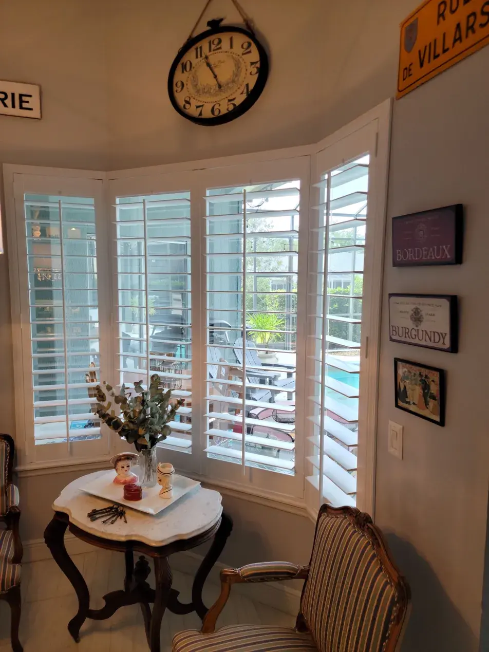 Café style shutters in curved kitchen nook