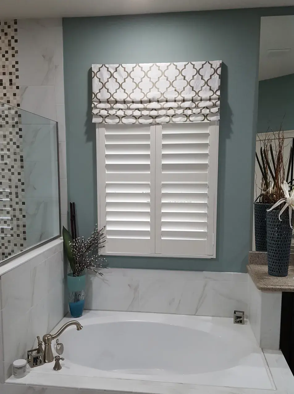 Bathroom shutters with decorative fabric valance